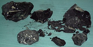 <span class="mw-page-title-main">Bitumen</span> Form of petroleum primarily used in road construction
