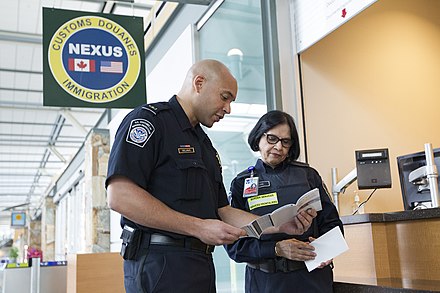 American and Canadian border officers at Vancouver airport