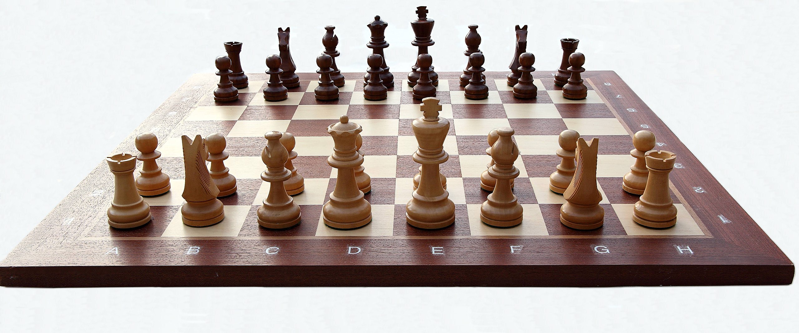 Chess Pieces In Starting Position On A Wooden Board Stock Photo - Download  Image Now - iStock