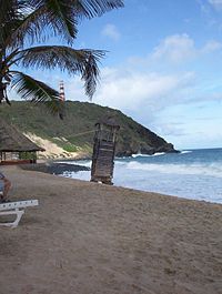 picture of the old wooden tower washed away by the seas in the winter of 2004