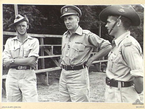 Brigadier Ivan Dougherty, Commander 21st Brigade (centre), with Major L. E. Walcott and Captain H. M. Hamilton (right) in December 1944