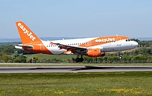 An EasyJet Europe Airbus A319 arrives at Bristol Airport in May 2019. This aircraft is registered in Austria as OE-LQQ.