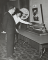 Eleanor Vadala and Earl Hayes, viewing an Airship fabric display, 1959