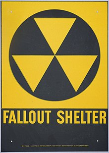 A fallout shelter sign in the United States of America, designed in 1961 by United States Army Corps of Engineers director of administrative logistics support function Robert W. Blakeley Fallout shelter sign (US).jpg