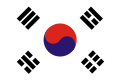 The flag of southern Korea from 1945 to 1948. This flag is similar to the current South Korean flag with the exception of a smaller version of the Taegeuk.