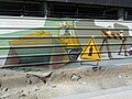 Graffiti sur les barrières de chantier