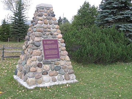 Plaques affixed to cairns were initially used to mark National Historic Sites, such as this one at Glengarry Landing in Ontario