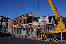 Original Lyttelton Harbour Board offices with earthquake damage; the top story has since been rebuilt to a modern design Harbour Board Offices 07.jpg