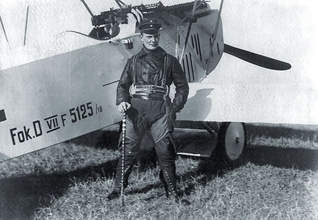 Hermann Goering commander of Jagdgeschwader I (World War I) beside his Fokker DVII 5125/1918. He holds a walking stick "Geschwader Stock" that had bee