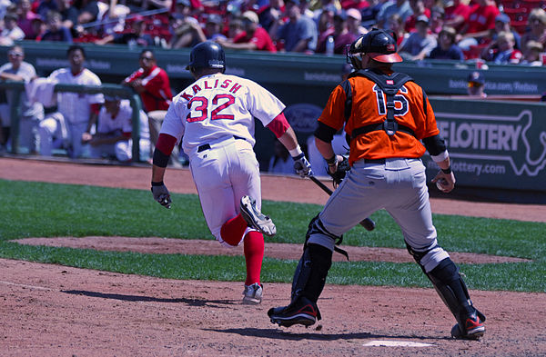 The batter attempting to advance to first base after an uncaught third strike, which the catcher has already retrieved and is about to throw to the fi