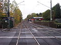 The view west across the Brunton Lane level crossing to Platform 1 23 October 2005