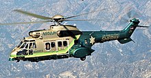 An L.A. County Sheriff's Department Super Puma flying a SAR mission