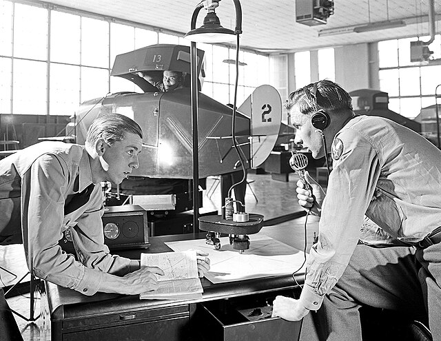 Military Personnel Using Link Trainer, Pepperell Manufacturing Co., 1943