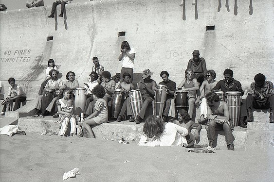 Musicians and listeners at San Francisco beach, 1970, USA