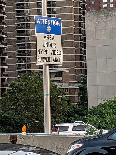 NYPD surveillance disclosure sign on the Brooklyn Bridge, in lower Manhattan.