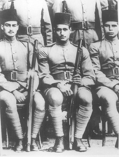 Nasser (center) with Ahmed Mazhar (left) in army, 1940