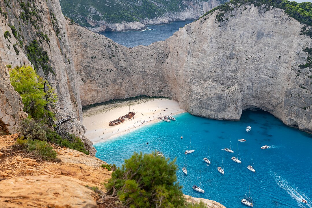 1080px-Navagio_Beach_and_wreck_of_the_MV_Panagiotis_%2831530077597%29.jpg