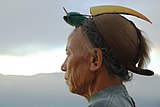 K10. A Nishi tribesman from Arunachal Pradesh wearing traditional headdress with hornbill beak. (FP)