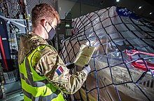 Pfizer COVID-19 vaccines being prepared by the RAF for delivery to Gibraltar. No. 1 Air Mobility Wing Preparing COVID-19 Vaccines for Gibraltar.jpg