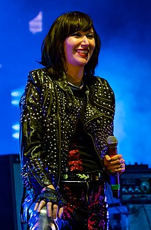 Orzolek performing with Yeah Yeah Yeahs in 2018