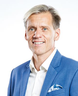 <span class="mw-page-title-main">Pauli Kiuru</span> Finnish triathlete, businessman and politician