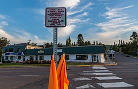 Box of orange pedestrian crossing flags in Grand Marais, Minnesota, 2017