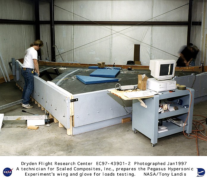 File:Pegasus Rocket Wing and PHYSX Glove Being Prepared for Stress Loads Testing DVIDS694565.jpg