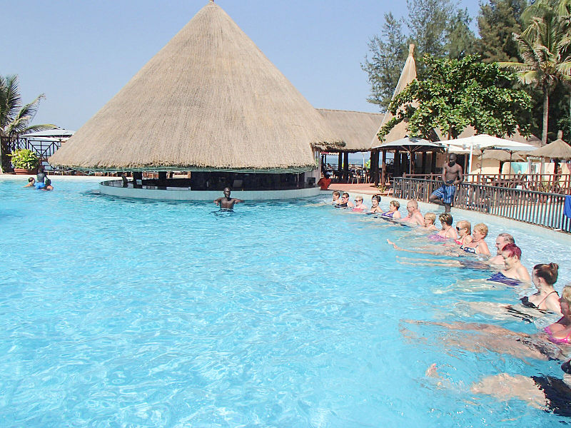 File:People tourists in swimming pool hotel Gambia.jpg