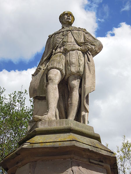 An 1864 Statue of Albert, Prince Consort, holding a plan of the Crystal Palace