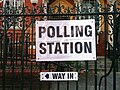 A sign with directions to a polling station, Holborn & St Pancras constituency. At the front of Highgate Library.