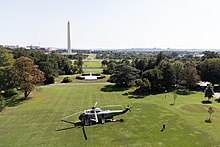 Marine One on the South Lawn with the Washington Monument (background) and the Jefferson Memorial (far background) in September 2018 President Trump Departs the South Lawn (43801759074).jpg
