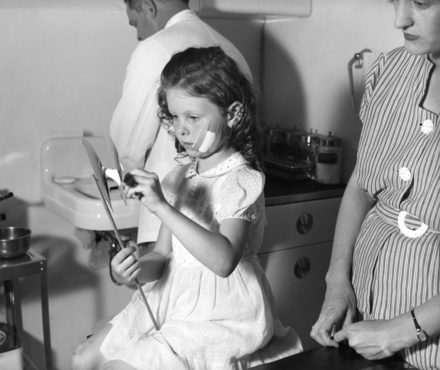 A young girl about to receive PEP after being bitten by an animal thought to be rabid