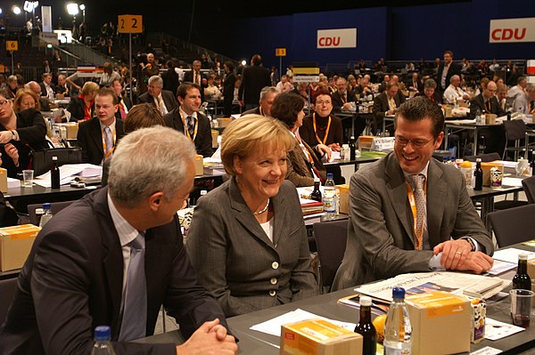 Ramsauer and Merkel with Karl-Theodor zu Guttenberg at a CDU party conference, 2008