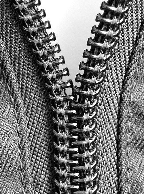 A coil zipper with its slider removed.