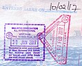Entry and exit stamps issued at Kuala Lumpur International Airport, as well as a separate entry stamp to Sabah
