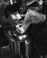 Sailor looking into the breech of 16 inch gun aboard USS Alabama (BB-60).jpg