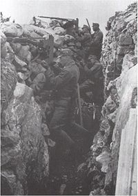 Austro-Hungarian troops defend against an Italian attack during the First Battle of the Isonzo. Schutzengraben im Karst.jpg