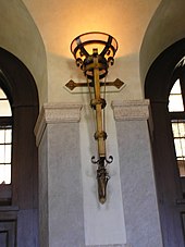 An electric sconce in the lobby of a luxury hotel Sconce.jpg