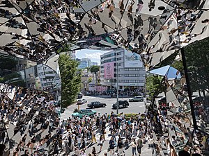 Street crowd reflecting in the polyhedral mirrors of the station Tokyu Plaza Omotesando, Harajuku, Tokyo, Japan.jpg