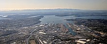 Aerial view of Tacoma, Washington, the Port of Tacoma, and Commencement Bay