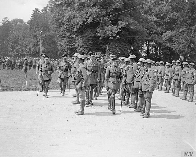 King George V inspecting the Guard of Honour on his visit to the III Corps headquarters at St. Gratien, 12 August 1918.