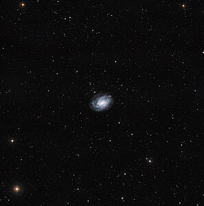 This wide field image shows the area around the spiral galaxy NGC 300, six million light-years from Earth