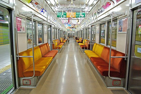 Early style interior of a Den-en-toshi Line set, February 2007