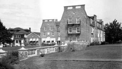 A view of Hendricks Hall in the Women's Memorial Quadrangle. To the left is the Mary Spiller House, a dormitory that was destroyed in 1951 to open that area of campus to formal landscaping. Image courtesy of the Oregon State Library. UO Hendricks Hall 3.jpg