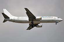 A UR Airlines Boeing 737-400 landing at Istanbul Sabiha Gokcen International Airport, Turkey (2019) UR Airlines, YI-AQS, Boeing 737-48E (49569609128).jpg