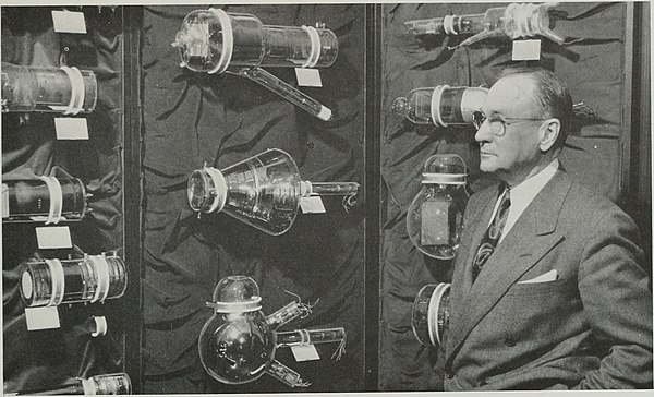 A display of numerous video camera tubes from the 1930s and 1940s, photographed in 1954, with iconoscope inventor Vladimir K. Zworykin.