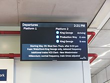 The digital "next arrival" sign at the Expo Line island platform Waterfront Station screen-Vancouver.jpg
