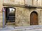 034 Edifici al carrer de Santa Anna, 2 (Tortosa), accés al c. de l'Escorxador Vell i portal.JPG