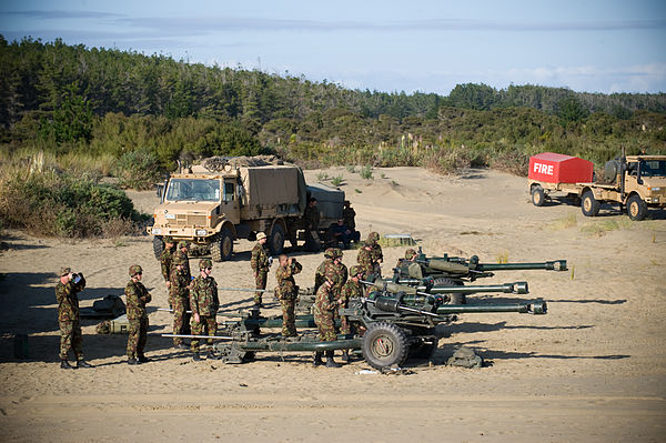 Battery field artillery training at the Kaipara weapons range using 105mm British light guns