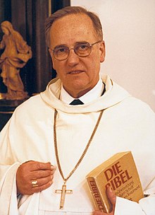 Abbot Gregory in the bowl with the Bible in hand in 2006